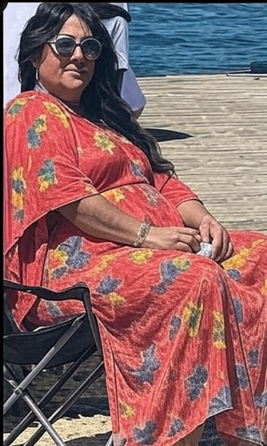 The Kimono covers fat up, so "she" thinks. LOL